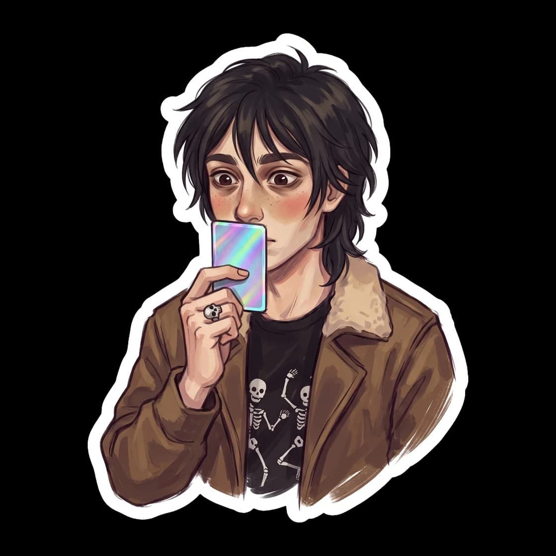 A younger Nico holds up a rare holographic Mythomagic card with quiet reverence. His oversized jacket hangs off his shoulders as he inspects the game stats.